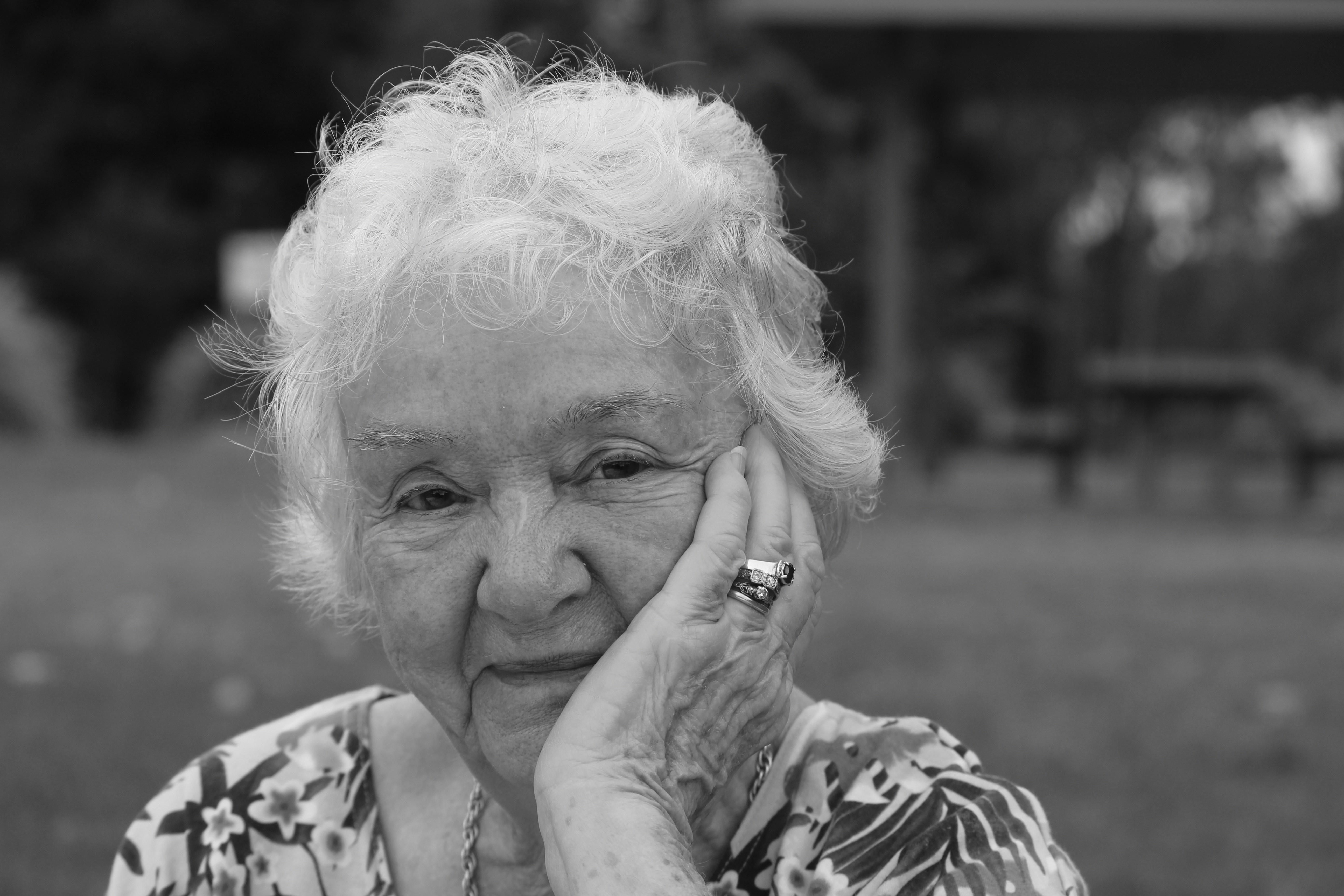 Happy mother smiling, touched by her story